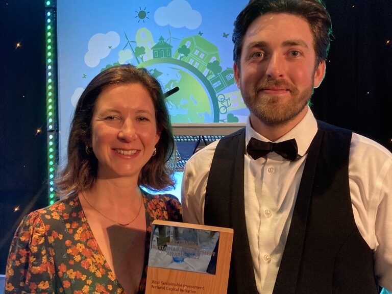 Emma and Ross from Revere collect award